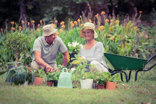 Professionals trimming hedges in a lush Barkingside garden